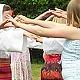 children folk dancing in vlaski costume at a fete