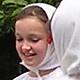 children folk dancing in vlaski costume at a fete